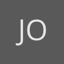 Joel avatar consisting of their initials in a circle with a dark grey background and light grey text.